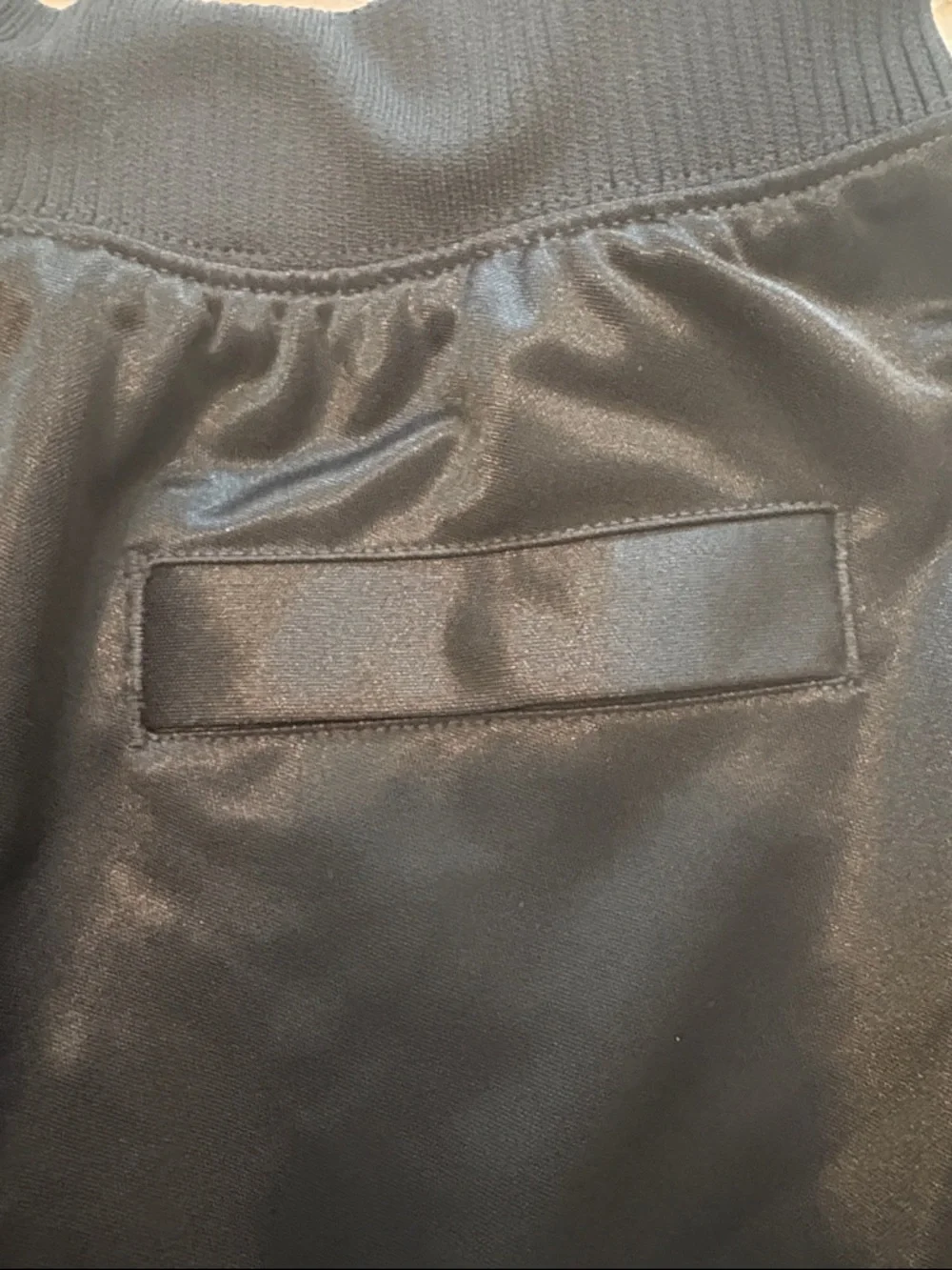 Air Jordan X Aleali May Women's Black Pleated Shorts with Blue & Green Accents - Picture 9 of 9